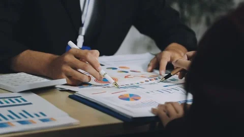 Anonymous hands of an accountant working with documents Stock Footage 333274963