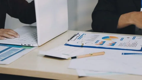 Anonymous hands of an accountant working with documents Stock Footage 333274974