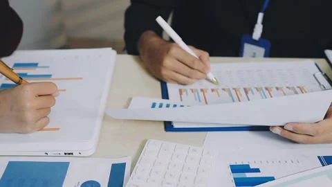 Anonymous hands of an accountant working with documents Stock Footage 333274987