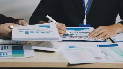 Anonymous hands of an accountant working with documents Stock Footage 333274994