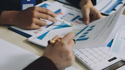 Anonymous hands of an accountant working with documents Stock Footage 333274999