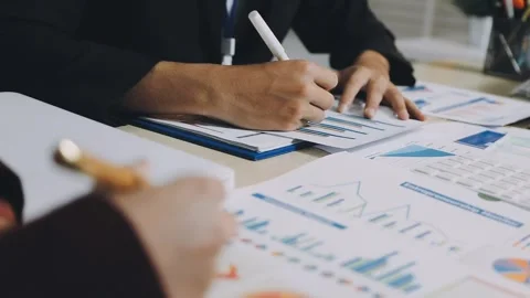 Anonymous hands of an accountant working with documents Stock Footage 333275018