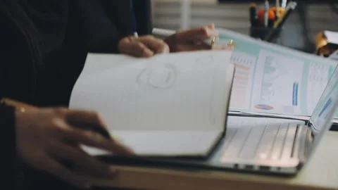 Anonymous hands of an accountant working with documents Stock Footage 333275037