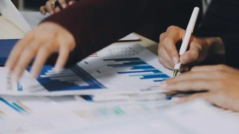 Anonymous hands of an accountant working with documents Stock Footage 333275039