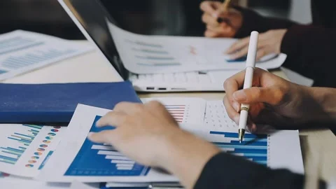 Anonymous hands of an accountant working with documents Stock Footage 333275056