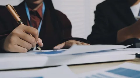 Anonymous hands of an accountant working with documents Stock Footage 333275062
