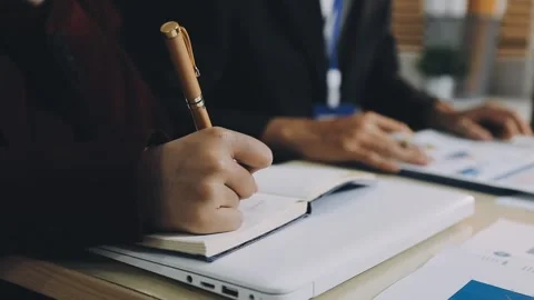 Anonymous hands of an accountant working with documents Stock Footage 333275066