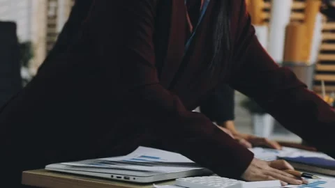 Anonymous hands of an accountant working with documents Stock Footage 333275100