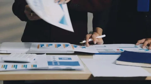 Anonymous hands of an accountant working with documents Stock Footage 333275106
