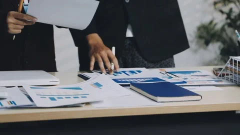Anonymous hands of an accountant working with documents Stock Footage 333275114