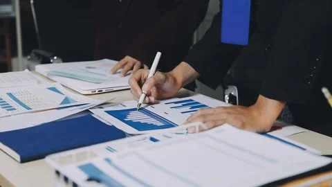 Anonymous hands of an accountant working with documents Stock Footage 333275119