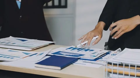 Anonymous hands of an accountant working with documents Stock Footage 333275127