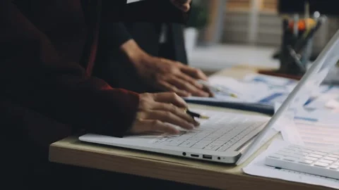 Anonymous hands of an accountant working with documents Stock Footage 333275135