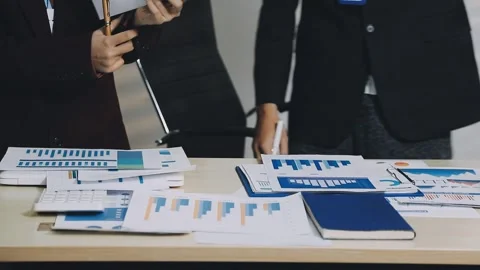 Anonymous hands of an accountant working with documents Stock Footage 333275146