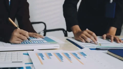 Anonymous hands of an accountant working with documents Stock Footage 333275163