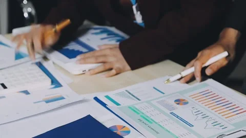 Anonymous hands of an accountant working with documents Stock Footage 333275168