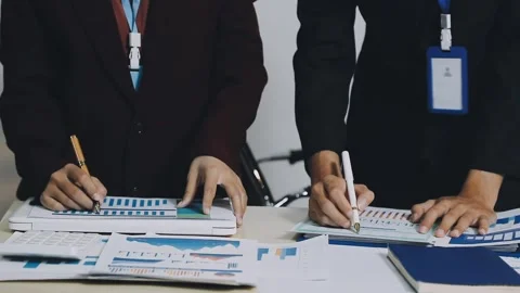 Anonymous hands of an accountant working with documents Stock Footage 333275169