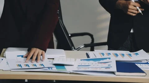 Anonymous hands of an accountant working with documents Stock Footage 333275188