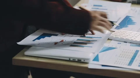 Anonymous hands of an accountant working with documents Stock Footage 333275191