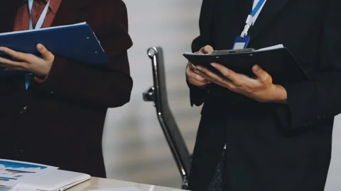 Anonymous hands of an accountant working with documents Stock Footage 333275193
