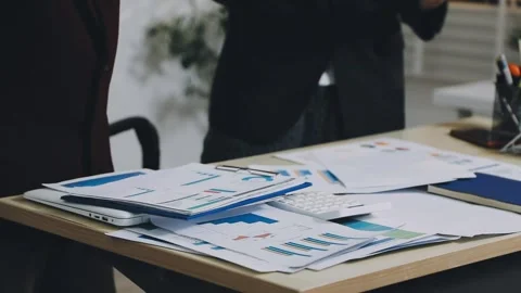 Anonymous hands of an accountant working with documents Stock Footage 333275201