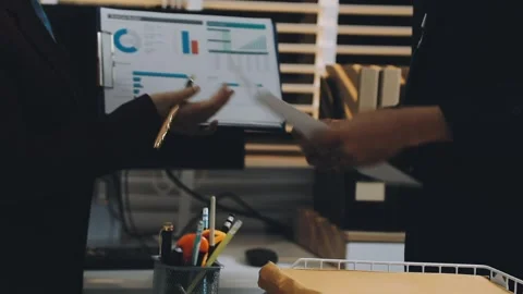 Anonymous hands of an accountant working with documents Stock Footage 333275204