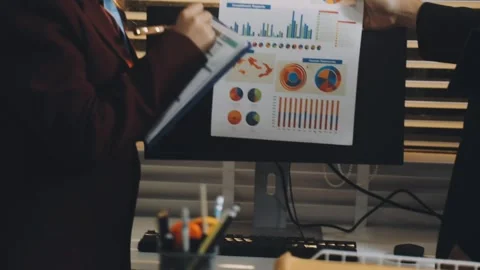 Anonymous hands of an accountant working with documents Stock Footage 333275206