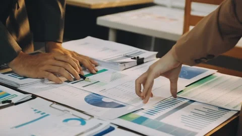 Anonymous hands of an accountant working with documents Stock Footage 333275222