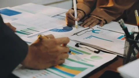 Anonymous hands of an accountant working with documents Stock Footage 333275258