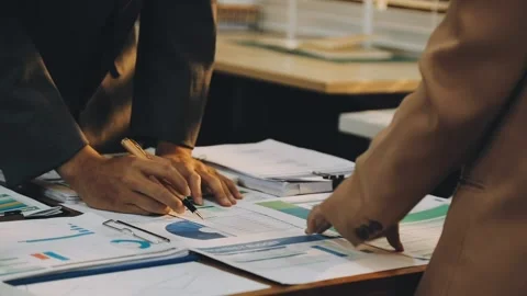 Anonymous hands of an accountant working with documents Stock Footage 333275259