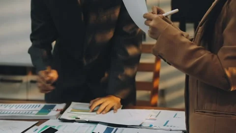 Anonymous hands of an accountant working with documents Stock Footage 333275278