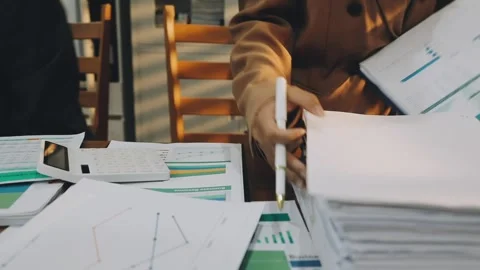 Anonymous hands of an accountant working with documents Stock Footage 333275282