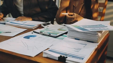 Anonymous hands of an accountant working with documents Stock Footage 333275283