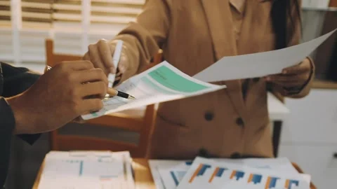 Anonymous hands of an accountant working with documents Stock Footage 333275286