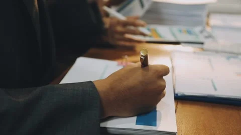 Anonymous hands of an accountant working with documents Stock Footage 333275288