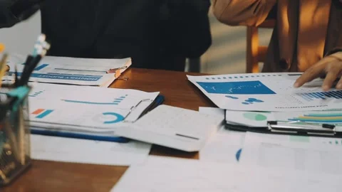 Anonymous hands of an accountant working with documents Stock Footage 333275300