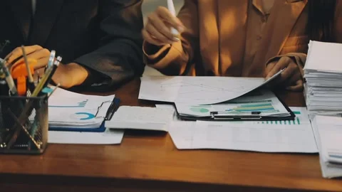 Anonymous hands of an accountant working with documents Stock Footage 333275305