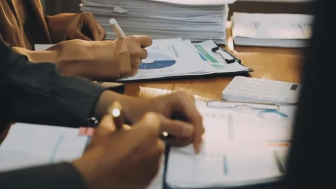 Anonymous hands of an accountant working with documents Stock Footage 333275308