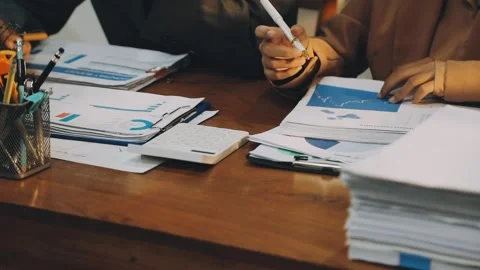 Anonymous hands of an accountant working with documents Stock Footage 333275320