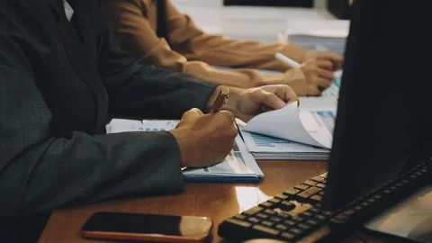 Anonymous hands of an accountant working with documents Stock Footage 333275332