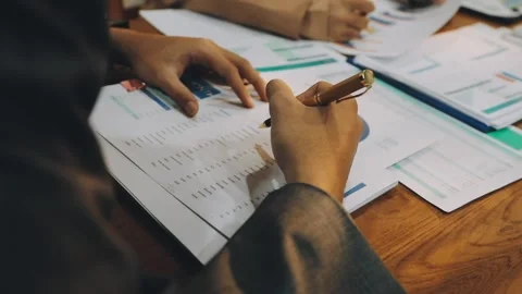 Anonymous hands of an accountant working with documents Stock Footage 333275354