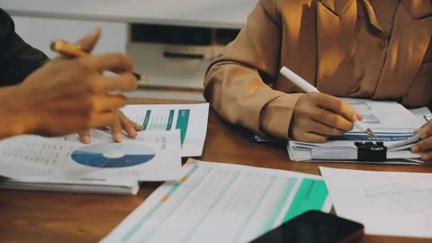 Anonymous hands of an accountant working with documents Stock Footage 333275360