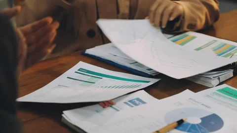 Anonymous hands of an accountant working with documents Stock Footage 333275365