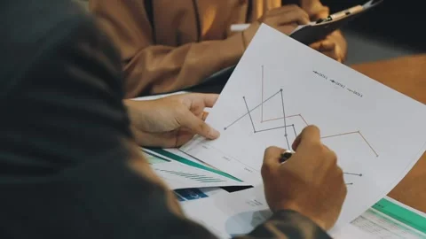 Anonymous hands of an accountant working with documents Stock Footage 333275369