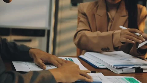 Anonymous hands of an accountant working with documents Stock Footage 333275370