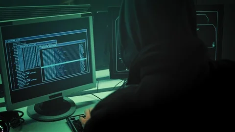 Anonymous Hooded Hacker Programming in Computer Console Breaking Password 動画素材 112131377