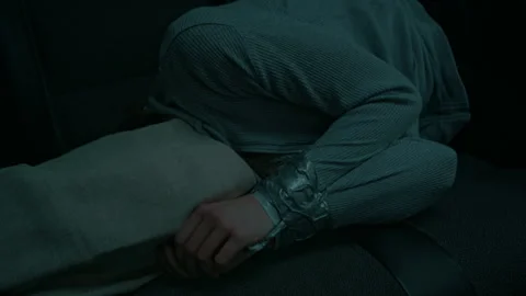 Anonymous Hostage with Sack on Head and Tied Hands Lying in Car Stock Footage 293630902