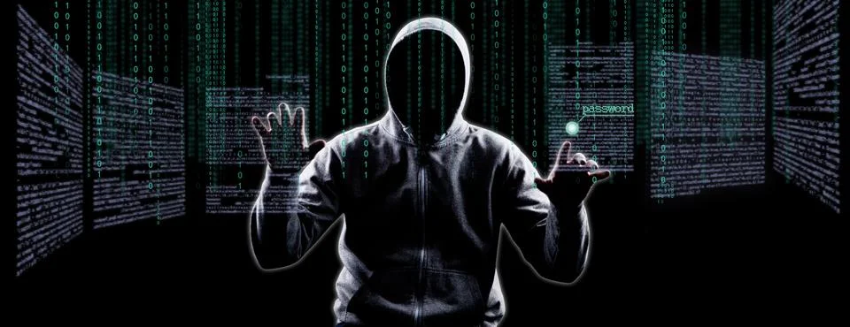 Anonymous internet hacker in front of computer. Web crime concept Stock Photos