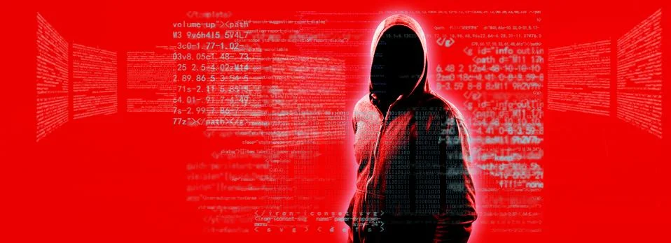 Anonymous internet hacker in front of computer. Web crime concept Stock Photos