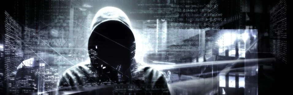 Anonymous internet hacker in front of computer. Web crime concept Stock Photos